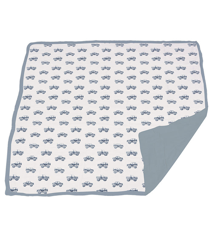 Indigo Monster Trucks cotton muslin blanket with blue fog border, 47"x47".
