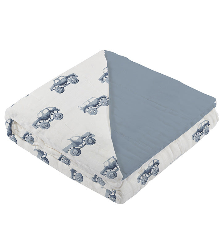 Indigo Monster Trucks and Blue Fog cotton blanket with breathable cotton muslin fabric.
