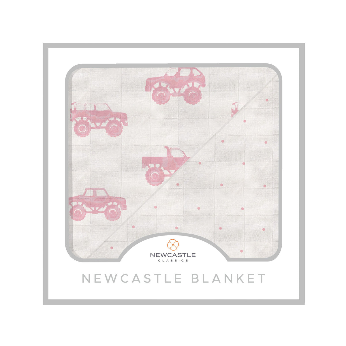 Bamboo muslin blanket with pink monster trucks print and a pink polka dot reverse side