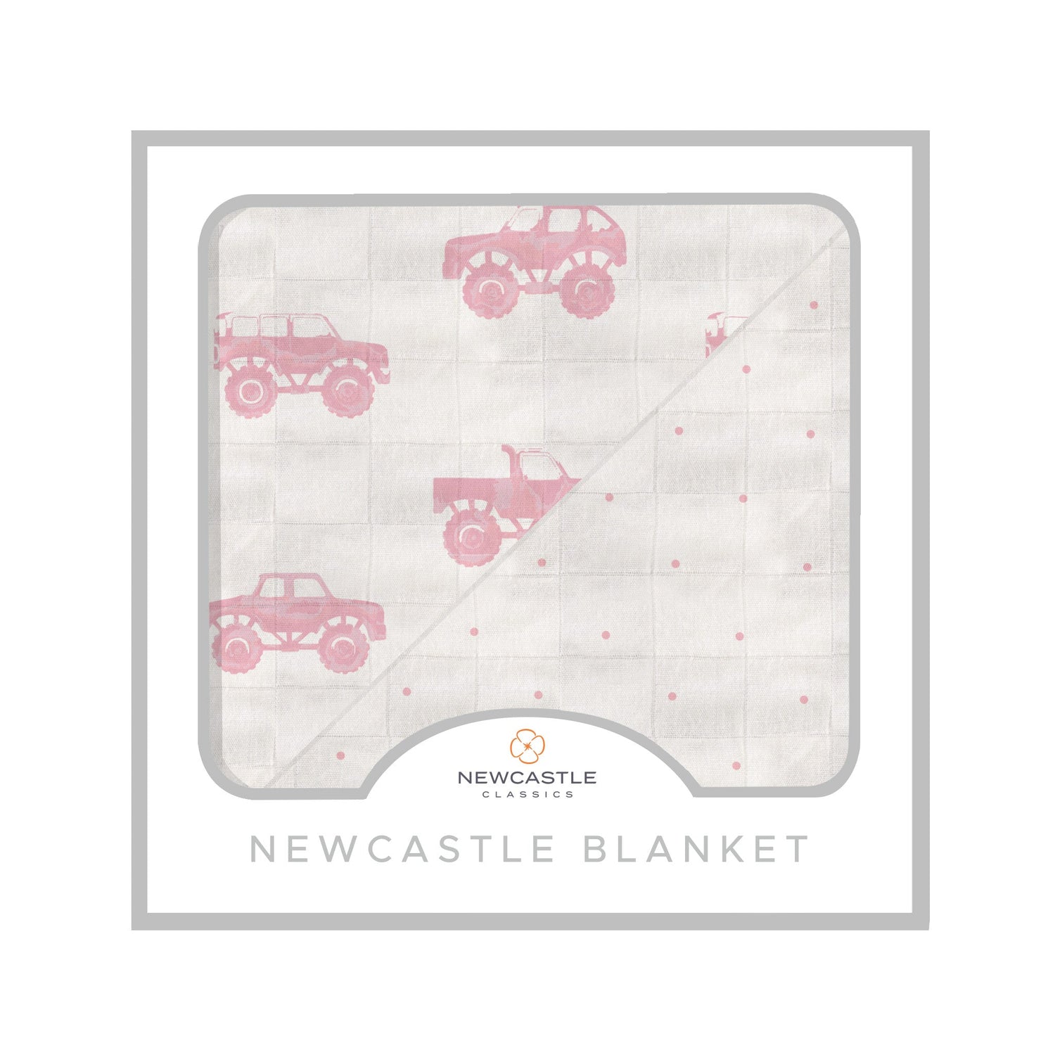 Bamboo muslin blanket with pink monster trucks print and a pink polka dot reverse side