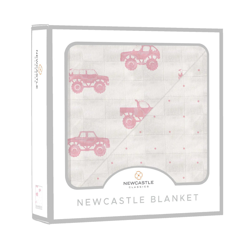 Pink Monster Trucks Newcastle Blanket with pink polka dots, 100% natural bamboo muslin, 47x47 inches.