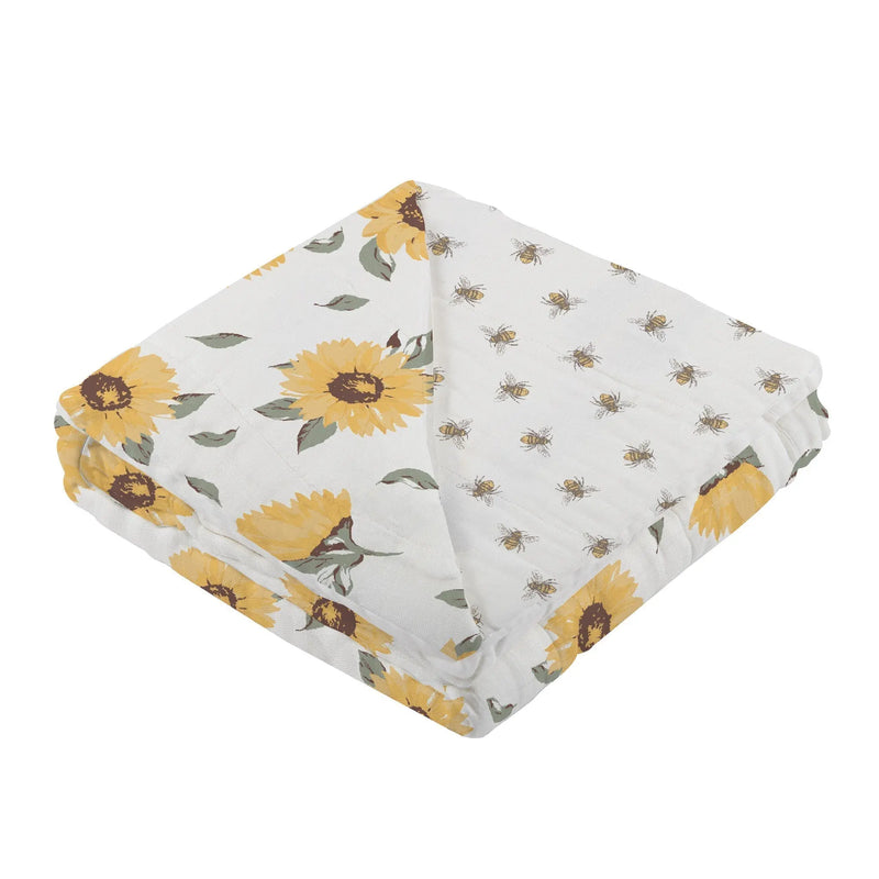 Sunflower and bee pattern bamboo muslin blanket.