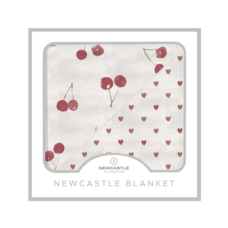 Two Hearts and Sweetheart Cherry Newcastle Blanket featuring cherry and heart patterns, made from 100% natural bamboo muslin, 47" x 47".