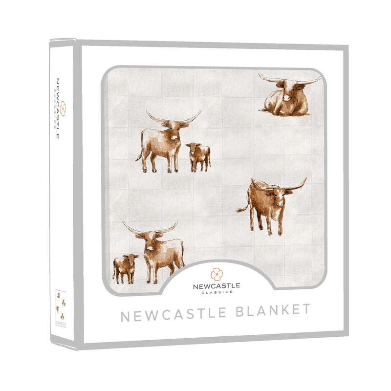 Longhorn Bamboo Newcastle Blanket in packaging with longhorn design, made from 100% natural bamboo muslin.