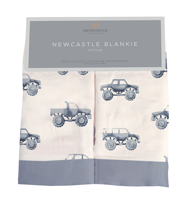 Small square cotton muslin baby blankie with an indigo monster trucks print