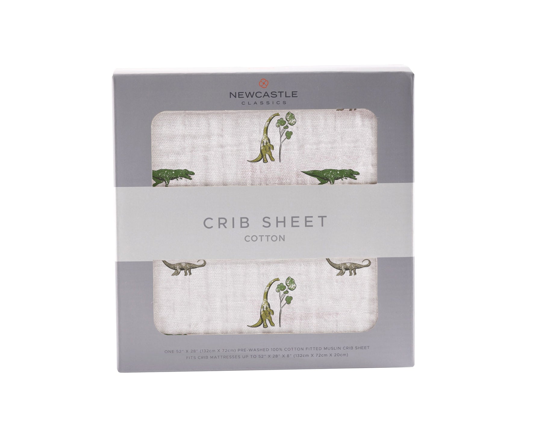 Cotton muslin crib sheet with a Dino Days dinosaur print fitted on a crib mattress