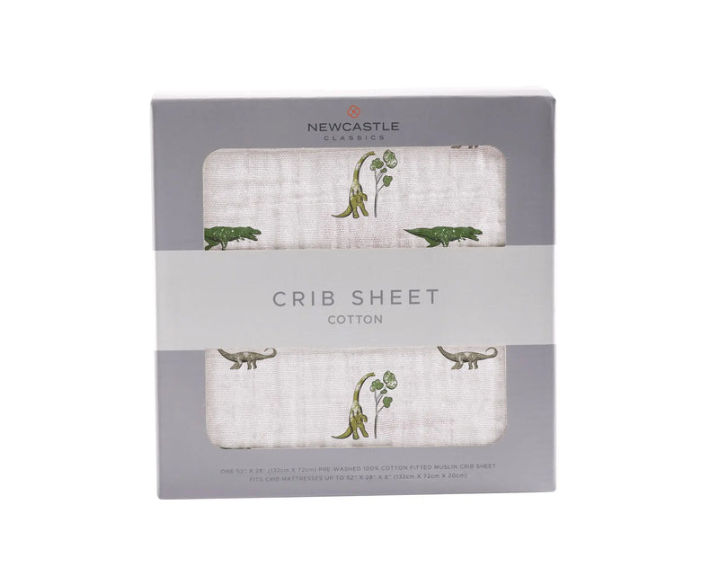 Dino Days cotton muslin crib sheet, breathable and soft, fits standard crib mattresses.