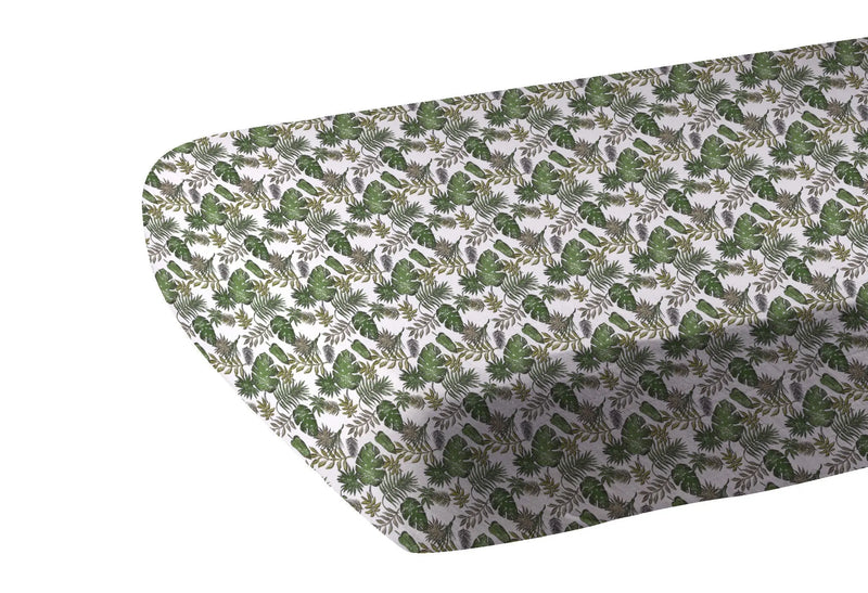 Tropical Forest Cotton Muslin Crib Sheet with breathable fabric and lush green leaf pattern.