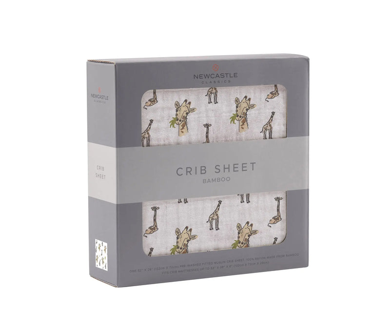 Hungry Giraffe Bamboo Muslin Crib Sheet in packaging with giraffe print design.