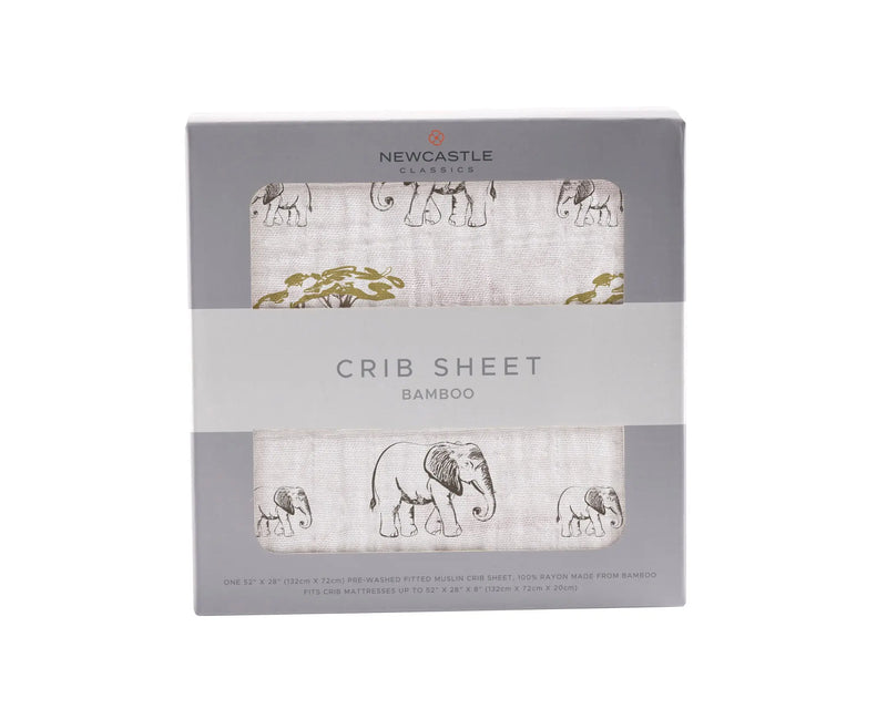 Bamboo muslin crib sheet with rhinos and elephants design, 28x52 inches, breathable and soft.