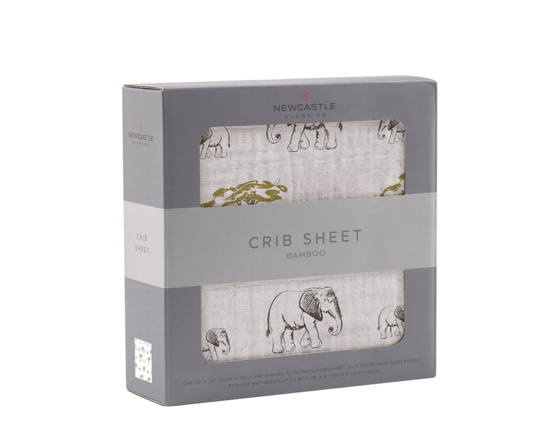Rhinos and Elephants Bamboo Muslin Crib Sheet in packaging.
