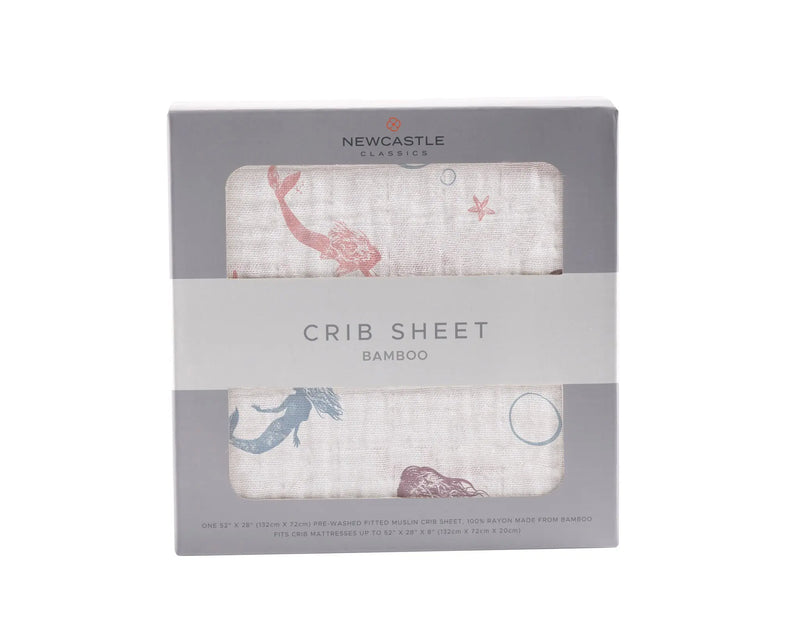 Mermaids Bamboo Muslin Crib Sheet in packaging, featuring soft breathable fabric.