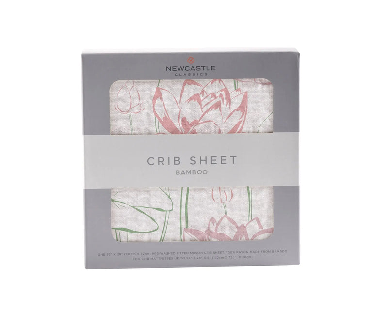 Water Lily Bamboo Muslin Crib Sheet in packaging, floral design.
