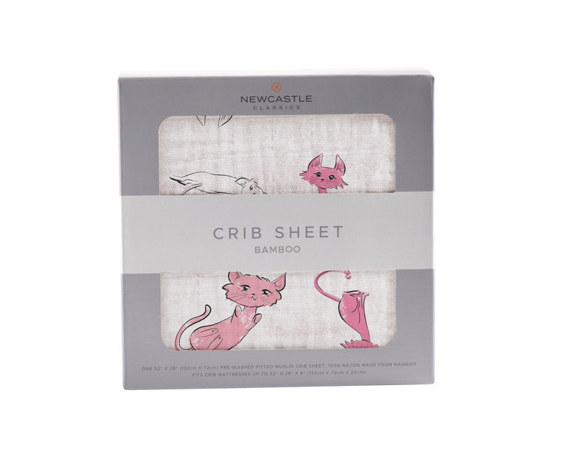 Playful Kitty Bamboo Muslin Crib Sheet in packaging, featuring pink cat designs on a soft, natural bamboo muslin fabric.