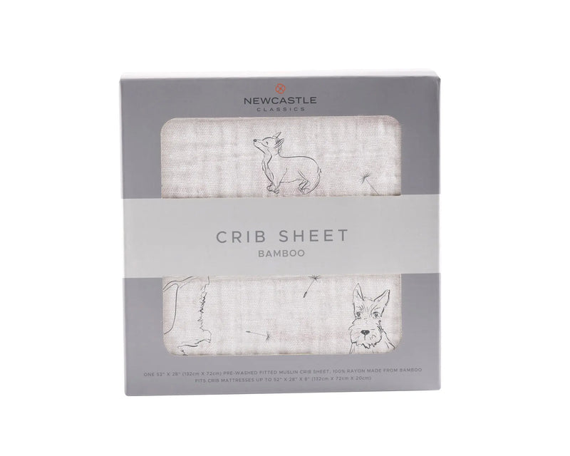 Corgi Bamboo Muslin Crib Sheet in packaging with soft breathable fabric.