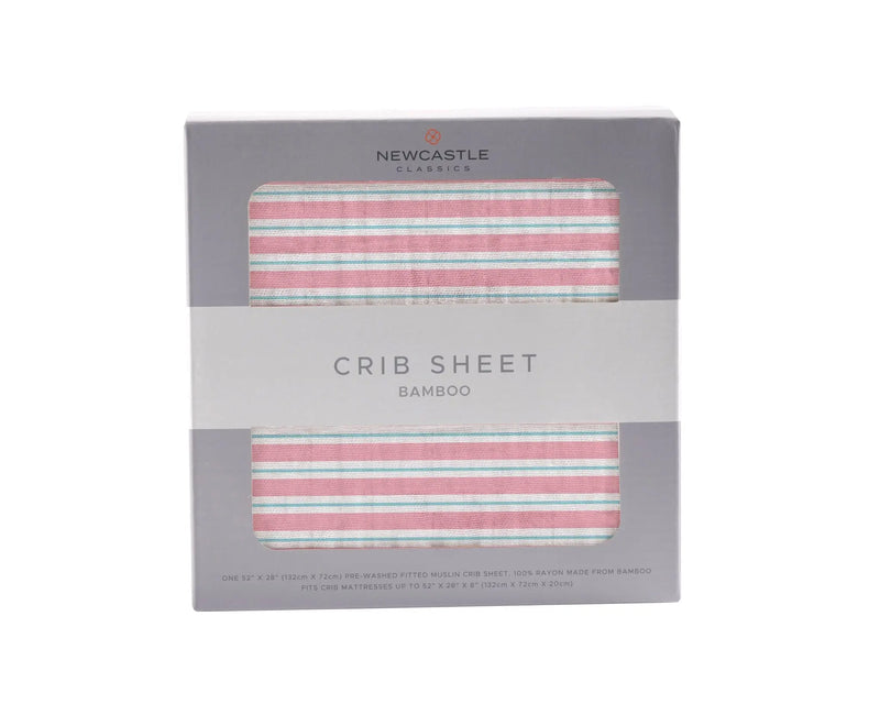 Candy Stripe Bamboo Muslin Crib Sheet in packaging.