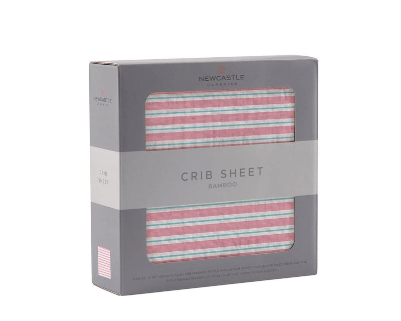 Candy Stripe Bamboo Muslin Crib Sheet in packaging.