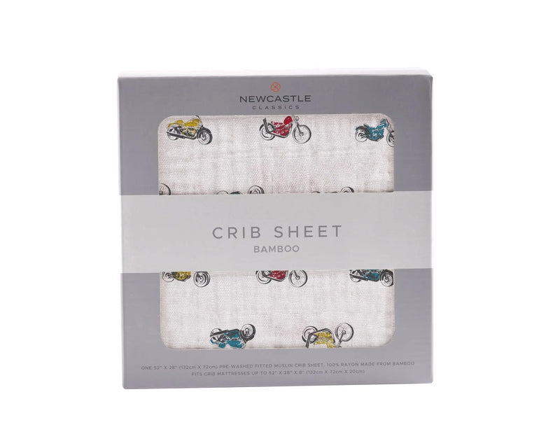 Vintage Motorcycles Bamboo Muslin Crib Sheet in packaging showing motorcycle design.