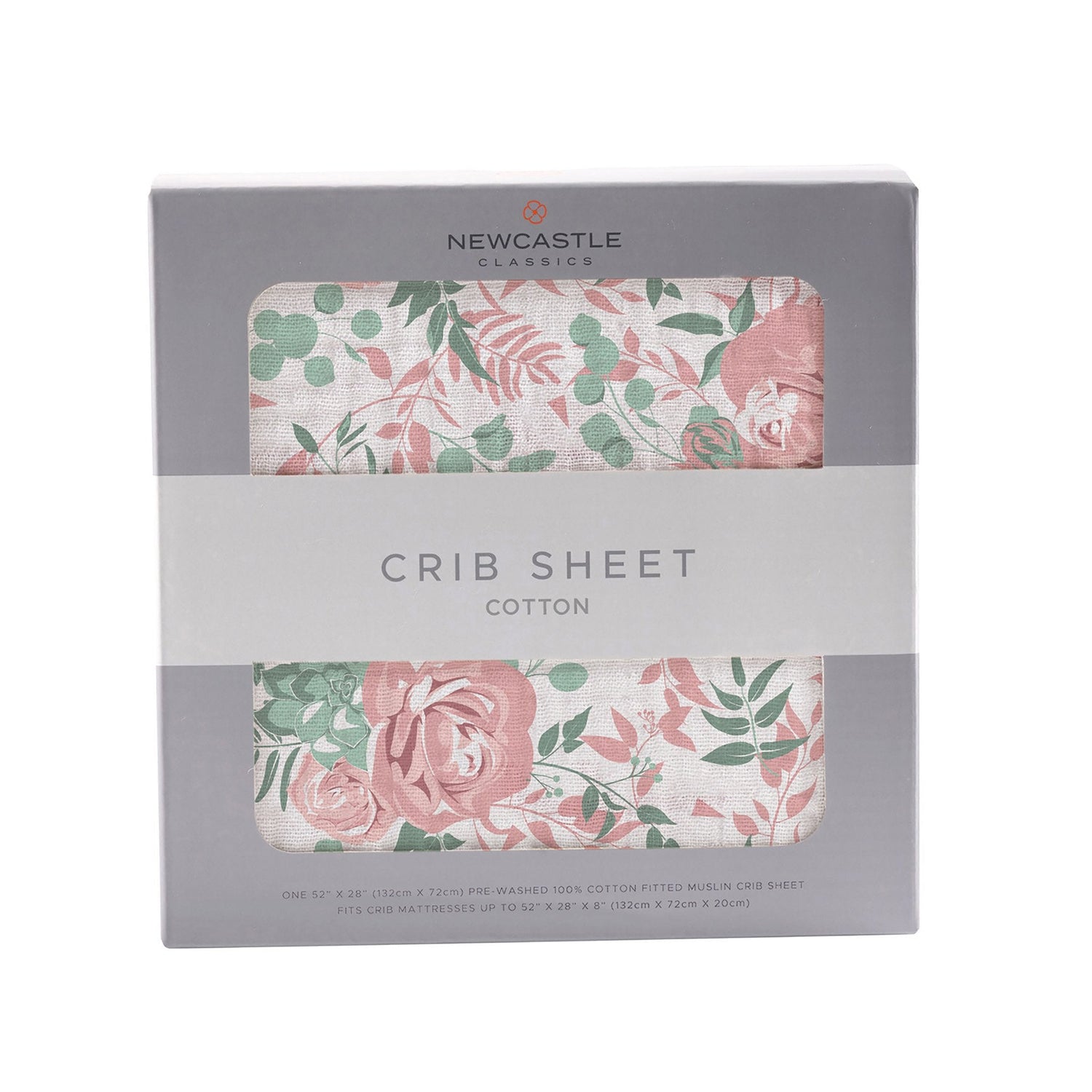 Desert Rose crib sheet in dusty pink cotton muslin fitted on a standard crib mattress