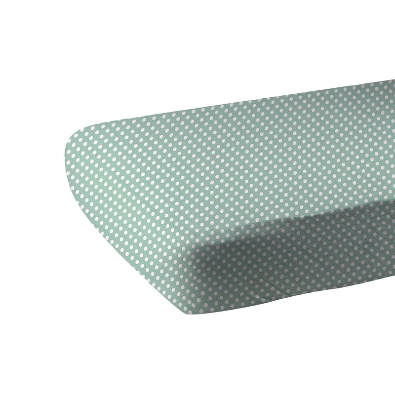 Jade polka dot cotton muslin crib sheet with breathable, soft material and snug fit on standard crib mattresses.