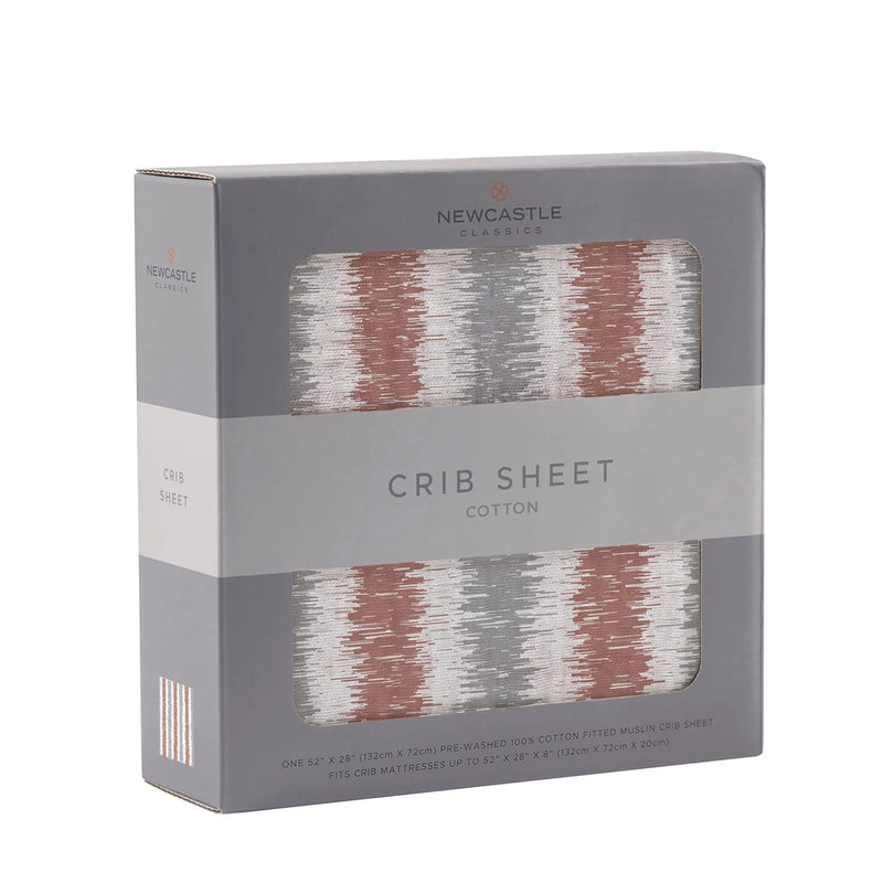 Western Stripe Cotton Muslin Crib Sheet in packaging.
