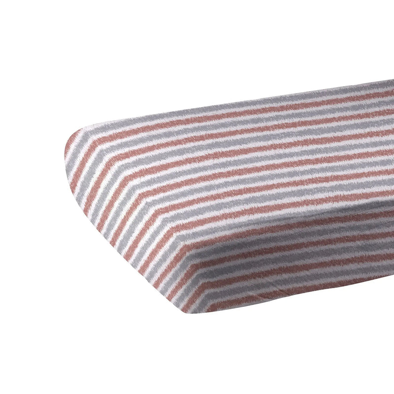 Western stripe cotton muslin crib sheet on mattress.