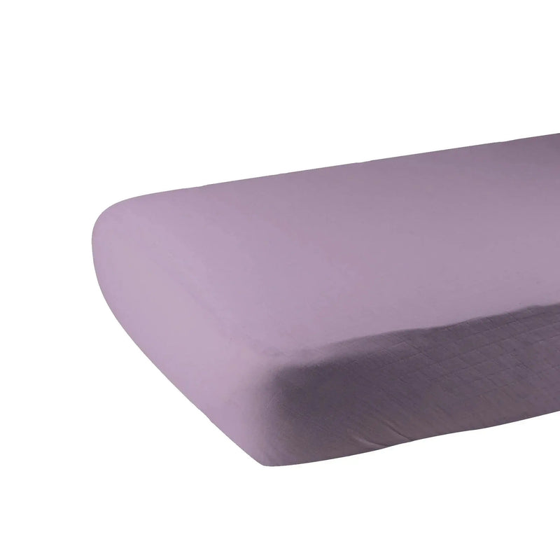Orchid lavender cotton crib sheet on mattress, 100% natural cotton muslin.