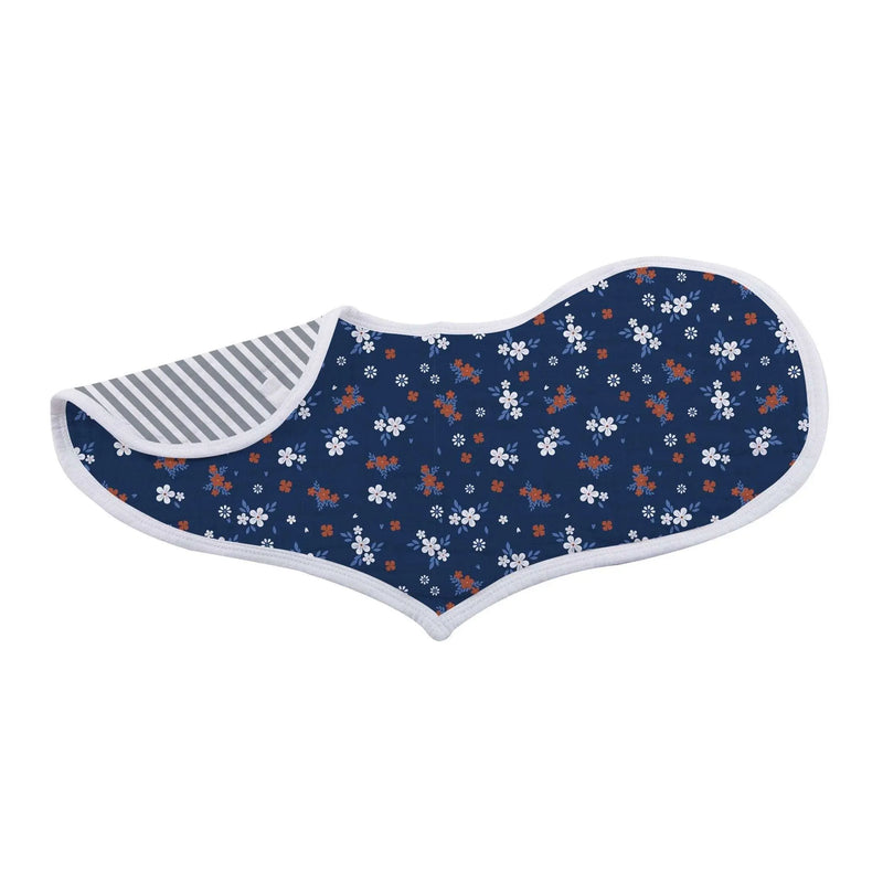 Blooms Floral Bamboo Heart Bib with floral pattern on navy background, showcasing soft bamboo muslin material.