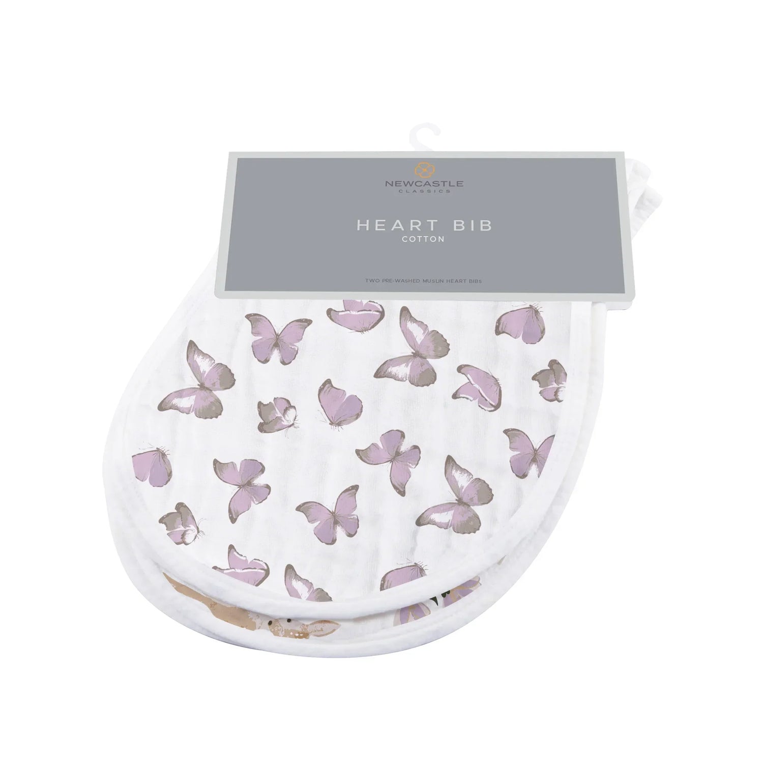 Pink heart-print cotton muslin bib with snaps along the neckline