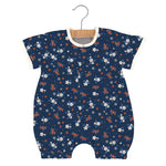 Baby romper in soft floral print with snap front and snap leg openings, made of bamboo muslin
