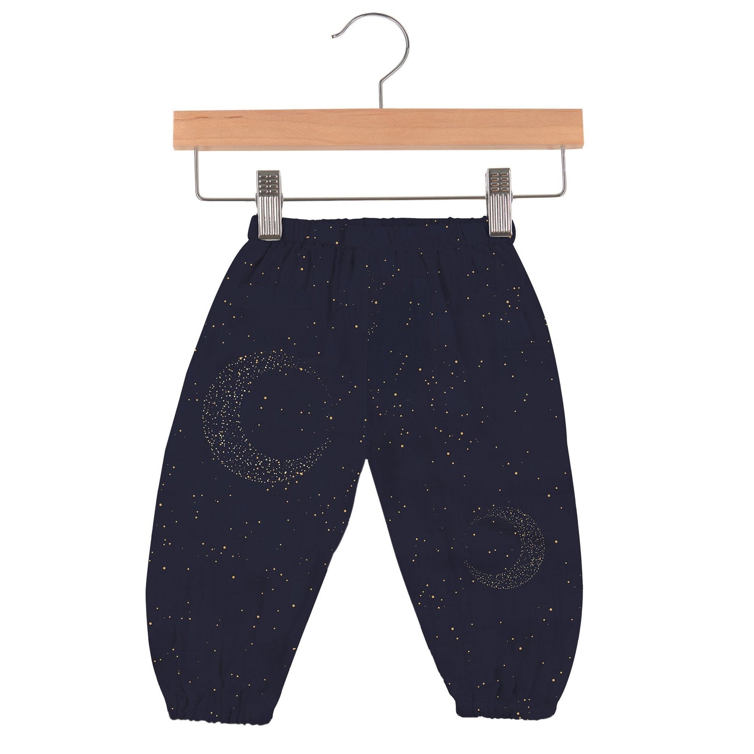 Baby pants in dark midnight blue with a moon and star pattern and an elastic waistband