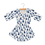 Bamboo muslin wrap dress in an indigo forest print with front tie closure
