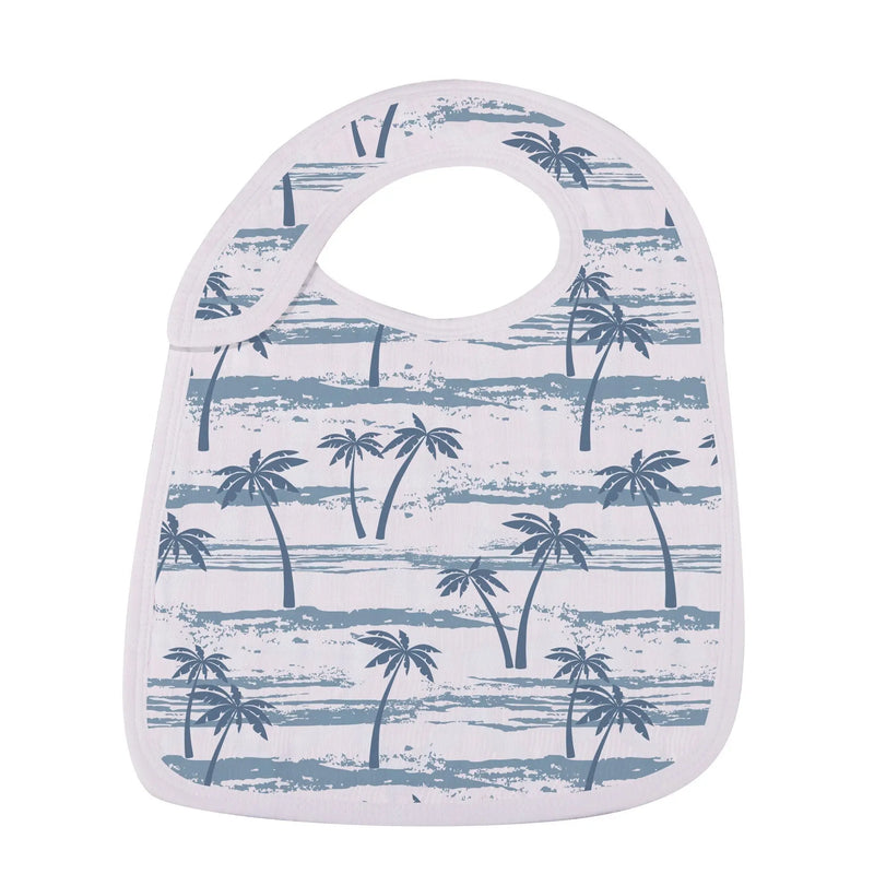 Ocean Tides Bamboo Snap Bib with palm tree design, made from soft, absorbent natural bamboo muslin.