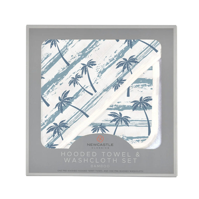 Bamboo hooded towel and washcloth set with ocean palm tree design.
