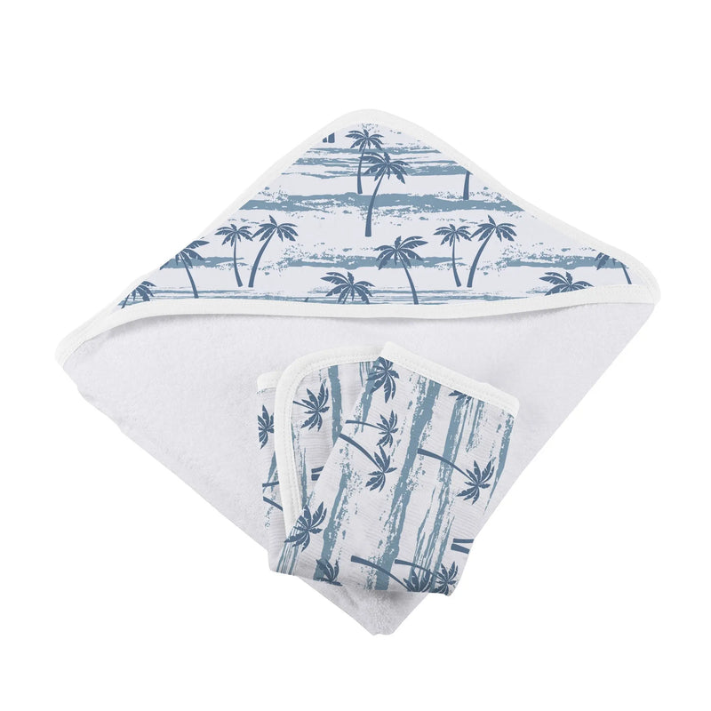 Bamboo hooded towel and washcloth set with ocean palm trees design.