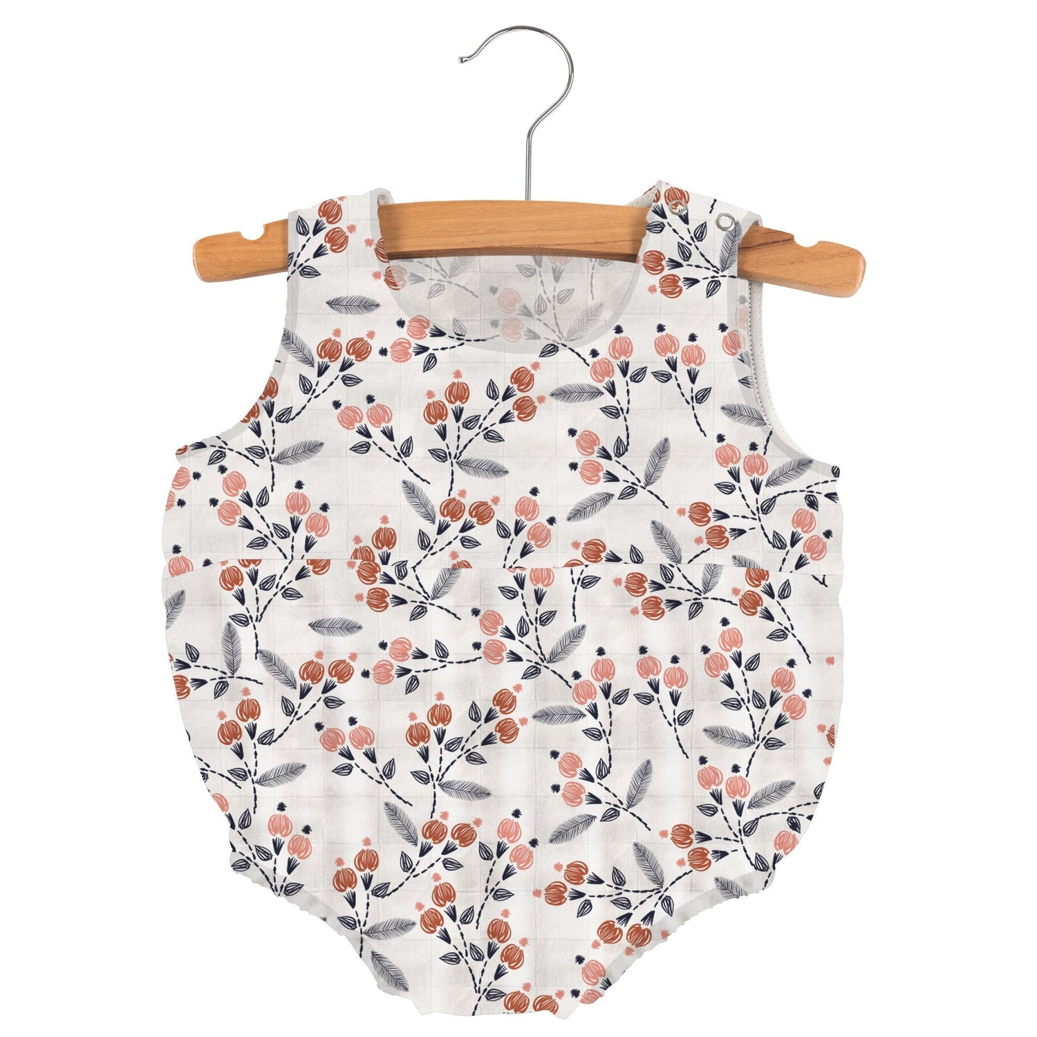 Sleeveless baby bubble one-piece in pink and white dahlia floral print with snaps at the neckline