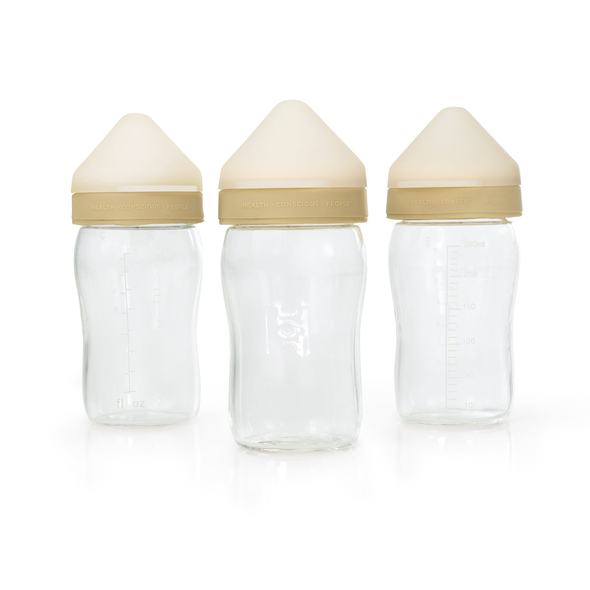 Set of three borosilicate glass baby bottles with one-piece silicone nipple-collars