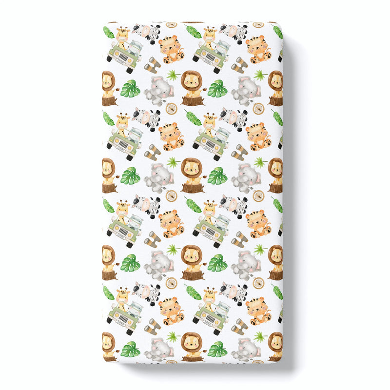 Safari-themed fitted crib sheet with animal patterns, ideal for standard cribs, made of soft rayon and spandex blend.