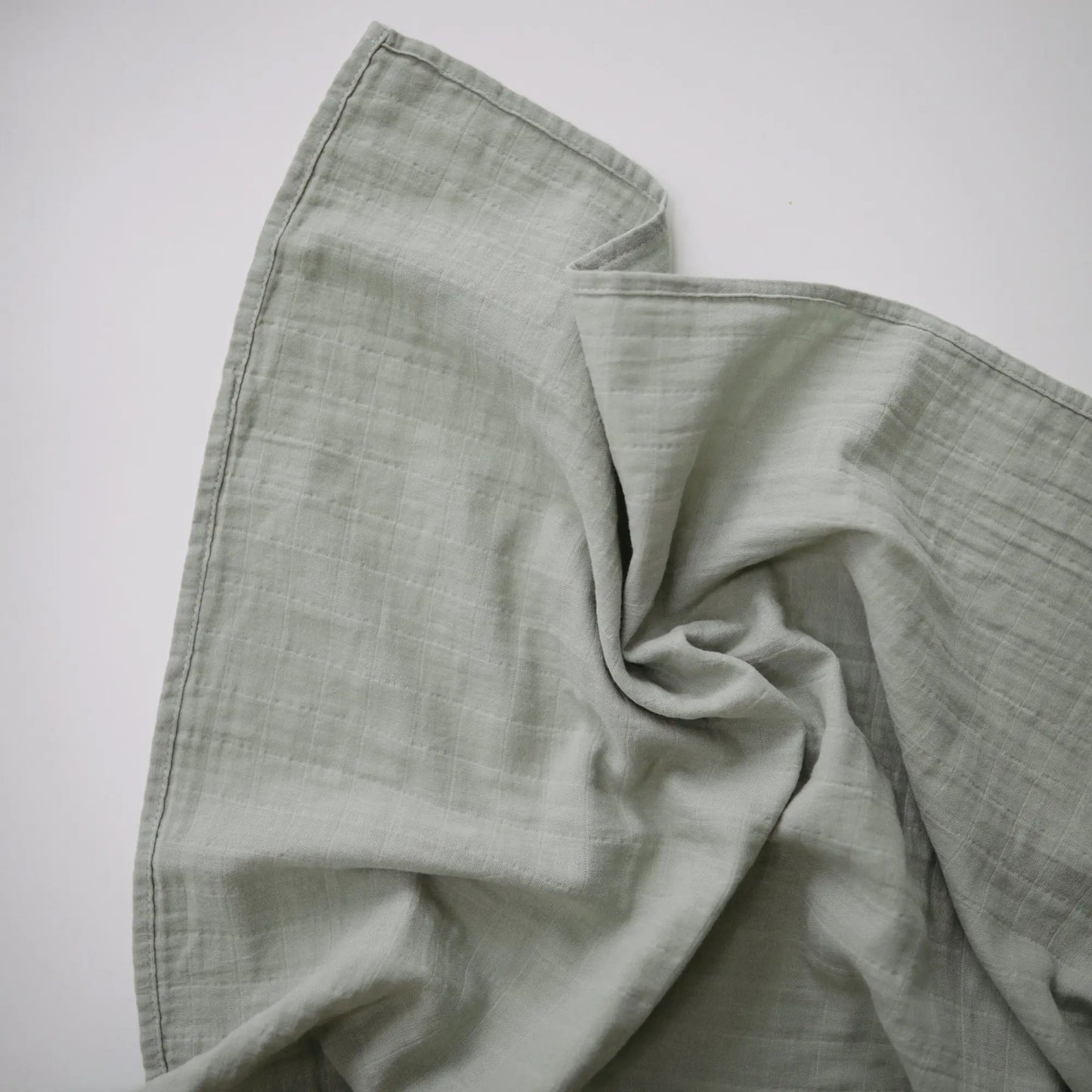 Organic Cotton Muslin Swaddle Blanket for Baby Cuddling and Nursing Mushie
