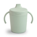 Trainer sippy cup with two easy-grip side handles and a removable lid