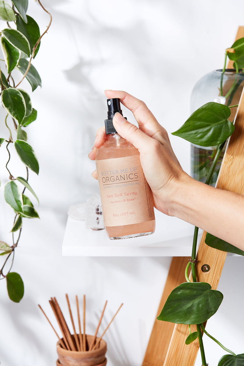 Organic pink Himalayan sea salt spray bottle with essential oils and natural ingredients.