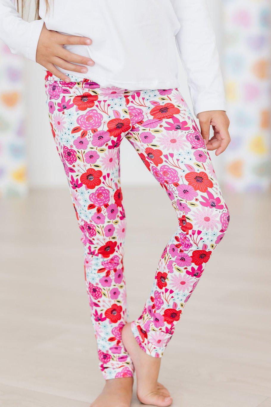 Mila & Rose Secret Garden organic baby leggings with floral print.