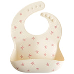 Mushie Silicone Baby Bib with Adjustable Neck Strap and Front Pocket for Easy Cleaning - Baby & Toddler > Nursing & Feeding > Bibs Silicone Bib