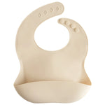 Mushie Silicone Baby Bib with Adjustable Neck Strap and Front Pocket for Easy Cleaning - Baby & Toddler > Nursing & Feeding > Bibs Silicone Bib