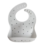 Mushie Silicone Baby Bib with Adjustable Neck Strap and Front Pocket for Easy Cleaning - Baby & Toddler > Nursing & Feeding > Bibs Silicone Bib