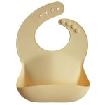 Mushie Silicone Baby Bib with Adjustable Neck Strap and Front Pocket for Easy Cleaning - Baby & Toddler > Nursing & Feeding > Bibs Silicone Bib