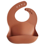 Mushie Silicone Baby Bib with Adjustable Neck Strap and Front Pocket for Easy Cleaning - Baby & Toddler > Nursing & Feeding > Bibs Silicone Bib