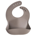 Mushie Silicone Baby Bib with Adjustable Neck Strap and Front Pocket for Easy Cleaning - Baby & Toddler > Nursing & Feeding > Bibs Silicone Bib