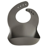 Mushie Silicone Baby Bib with Adjustable Neck Strap and Front Pocket for Easy Cleaning - Baby & Toddler > Nursing & Feeding > Bibs Silicone Bib
