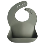 Mushie Silicone Baby Bib with Adjustable Neck Strap and Front Pocket for Easy Cleaning - Baby & Toddler > Nursing & Feeding > Bibs Silicone Bib